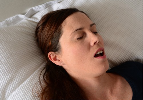 Woman with central sleep apnea sleeping 